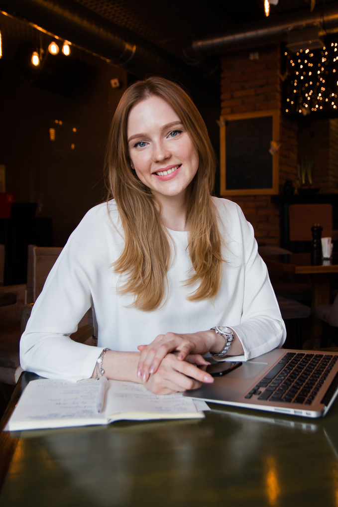Woman Working with a Laptop